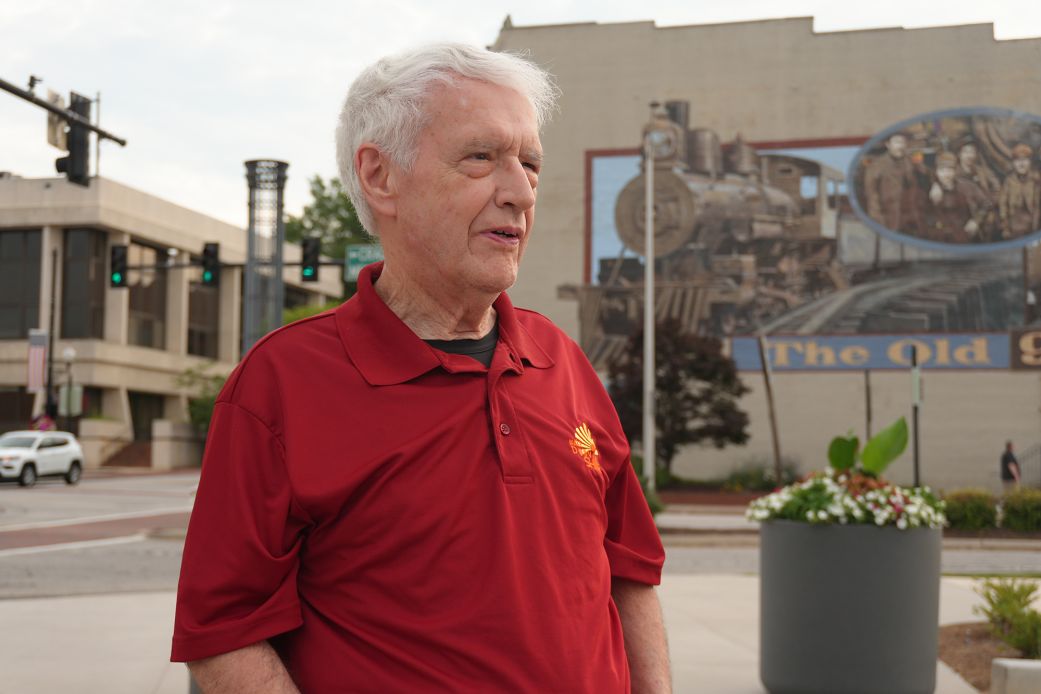 Why America is obsessed with a grandpa in high-waisted pants who is building sidewalks