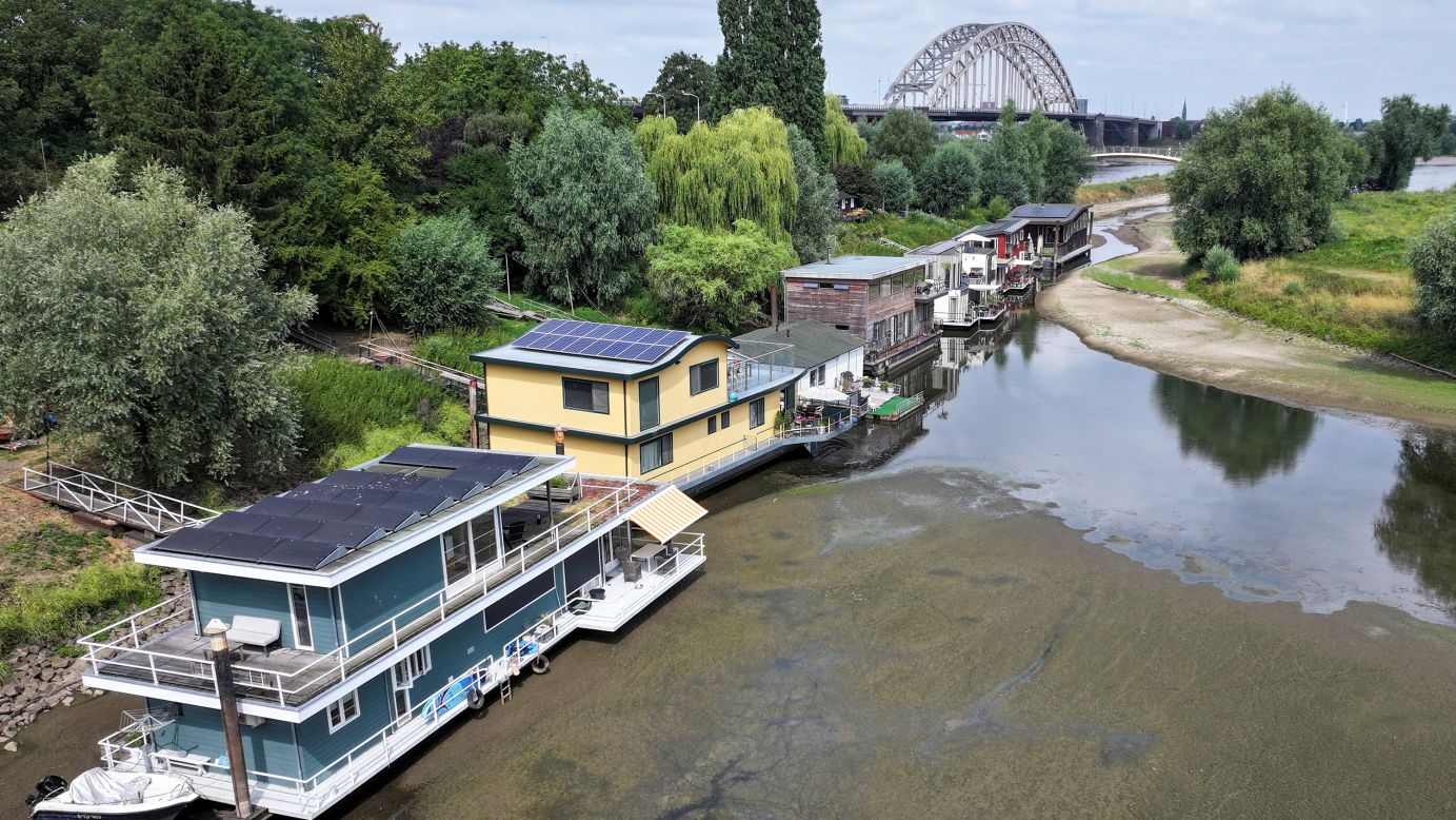 Stranded houseboats and grounded cruise ships: Europe’s rivers are shrinking amid heat and drought