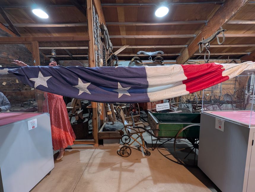 A 48-star US flag, the size of a single bedroom apartment, has draped a Minnesota community in red, white and blue mystery